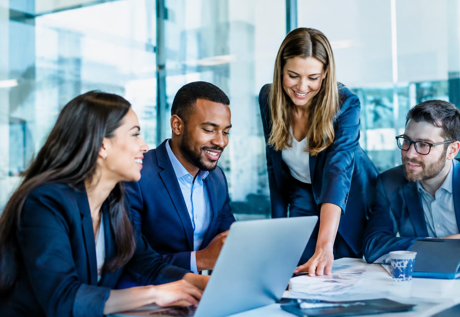 Recruitment team collaborating in a modern office